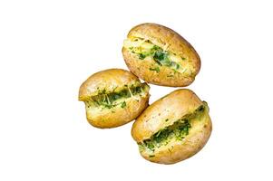 Baked Jacket potatoes with cheese, herbs and butter. Isolated on white background. photo
