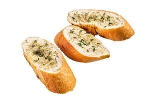 Garlic butter on Toasted Baguette bread with Salt, Pepper, Thyme and Olive. Isolated on white background, top view. photo