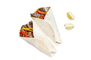 Fajitas Tortilla wrap with beef meat stripes, colored bell pepper and onions and salsa. Isolated on white background, Top view. photo