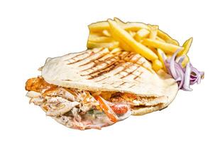 Doner kebab, Shawarma in grilled pita bread with vegetables, meat and french fry. Isolated, white background. photo