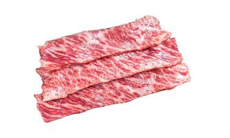 Premium raw sliced wagyu beef A5 steaks on a grill for yakiniku. Japanese foods. Isolated on white background. photo
