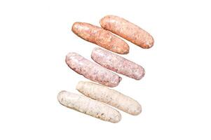 Assorted fresh raw pork, beef and chicken sausages with spices. Isolated on white background. Top view. photo