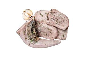 Cooked Boiled veal or beef tongue sliced in a wooden tray. Isolated on white background. photo