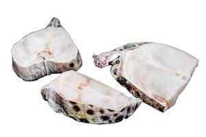 Raw atlantic wolffish fish Steak. Isolated on white background, top view. photo
