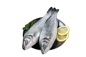 Fresh Raw Sea Bass fish with lemon and thyme. Isolated on white background. Top view. photo