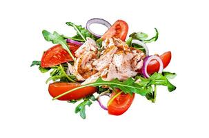 Salad with baked salmon fillet steak, fresh arugula and tomato Isolated on white background, top view. photo