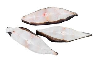 Raw fresh steak fish halibut Isolated on white background. Top view. photo