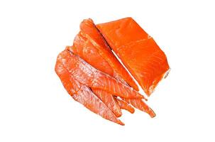 Sliced Smoked salmon fillet on a wooden cutting board with herbs. Isolated on white background, top view. photo