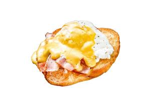 Brioche sandwich with bacon, egg Benedict and hollandaise sauce. Isolated on white background. Top view. photo