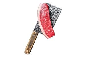 Fresh Raw top sirloin beef meat steak on a butcher cleaver. Isolated on white background, top view. photo