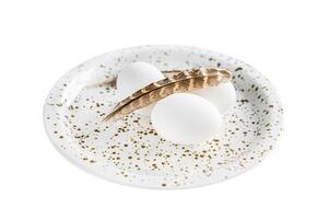 White background with white eggs and feathers. Isolated on white background. Top view. photo