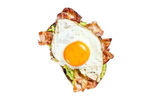 English breakfast, toast with bacon, avocado and egg Isolated on white background. Top view. photo