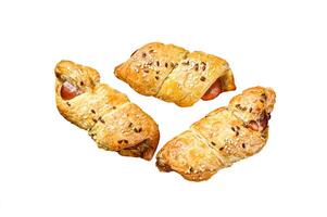 Cutting board with sausage rolls in the dough. Isolated on white background. photo