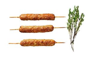 Lula kebab. Shish kebab on a stick, from ground beef meat. Isolated on white background. Top view. photo