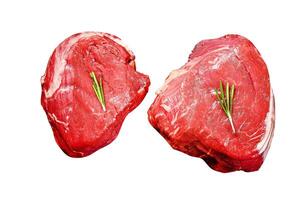 Filet Mignon steak Isolated on white background. Top view. photo