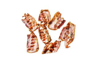 Slices of crispy hot fried cooked bacon. Farm organic meat. Isolated on white background. Top view. photo