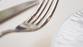 An Elegant Table Setting Featuring a Fork and Knife for Dining That Exudes Sophistication video