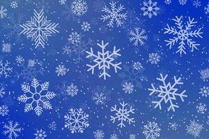 Falling snowflakes on blue background. Winter background, snowflakes on a beautiful background vector