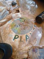 Save the planet concept. Mud and other garbage caused danger storms. photo