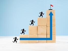 Common goal success concept. Teamwork rises to target and achieves a successful business photo