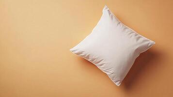 Minimalist White Pillow on Warm Beige Background for Interior Design and Home Decor Concepts photo