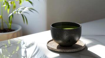 Simple elegance embodied in a cup of matcha on a coaster photo