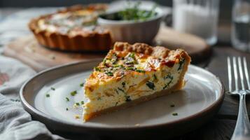 Clean and modern presentation of a slice of quiche on a plate photo