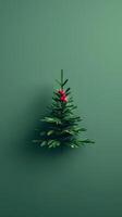A Christmas tree with red berries on it photo