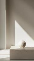 Minimalist Still Life with Marble Sphere and Geometric Shadows in Natural Light photo