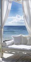 Serene Beachfront Cabana with White Curtains Overlooking the Ocean photo
