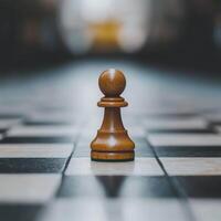 Chess Pawn on a Checkered Board Symbolizing Strategy, Leadership, and Potential in a Game of Chess photo