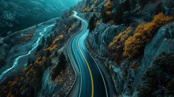 Aerial perspective of a road trip journey with scenic landscapes below photo
