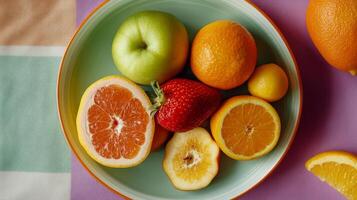 Fresh and Vibrant Assortment of Citrus Fruits and Strawberries photo