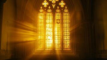 Backlit silhouette of a church window with stained glass photo