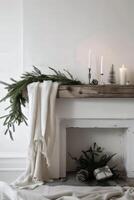 A mantle with a white blanket draped over it and a tree on it photo