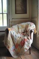 Cozy Vintage Armchair with Patchwork Quilt in Rustic Sunlit Room by a Window photo