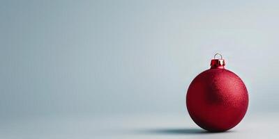 A red ball with a red ribbon on it photo