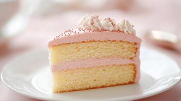 Delicious Slice of Vanilla Cake with Pink Frosting and Whipped Cream photo