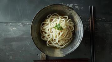 Contemporary minimalism captured in a bowl of udon noodles photo