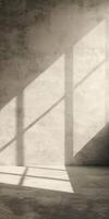 Sunlight Casting Geometric Shadows on Minimalist Concrete Wall in Modern Interior Space photo