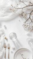 A white table with a glass photo