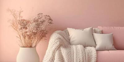 Cozy Minimalist Living Room with Soft Pink Sofa and Decorative Dried Flowers in a Modern Vase photo