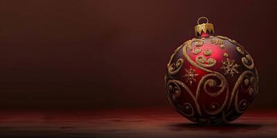 A red ornament with gold trim sits on a table photo