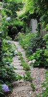 Serene Garden Pathway with Lush Greenery and Blooming Flowers photo