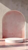 A minimalist scene featuring a pink and white archway with a round platform photo