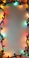 Festive Colorful Christmas Lights Frame on a Blank Background for Holiday Celebrations photo