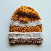 Cozy Hand-Knitted Beanie in Warm Earth Tones on Minimalist White Background photo