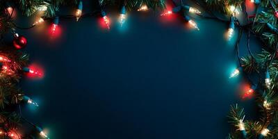 Festive Christmas Lights and Greenery Border on Dark Background for Holiday Celebrations photo