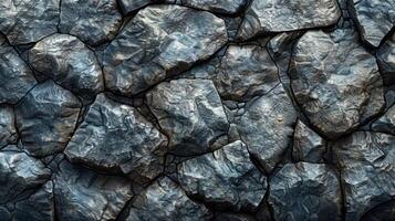 A wall made of large rocks with a metallic sheen photo
