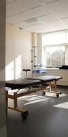 Uncluttered area in a physiotherapy session suitable for adding text. photo